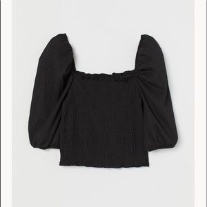 Black smock top with puff sleeves